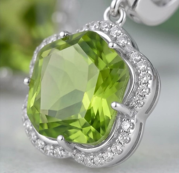 Green Clover 10.9 carat authentic Brazilian Peridot .925 Sterling Silver Handcrafted Statement Earrings - Close-up of green peridot pendant in silver setting with diamond accents.