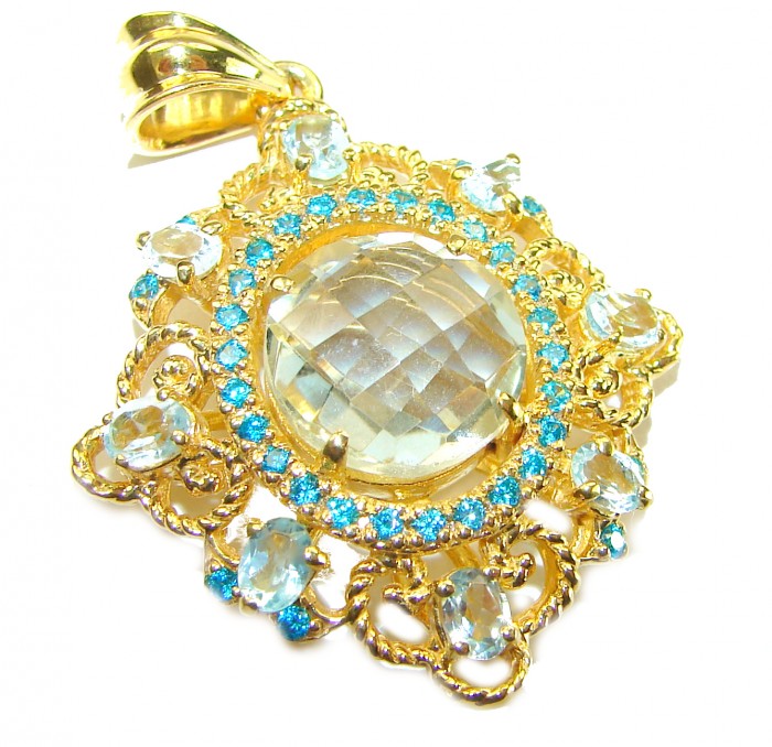 Celtic Spirit authentic fancy cut 14.5 carat White Topaz 18K Gold over .925 Sterling Silver handcrafted Statement Pendant - Close-up of 18K gold pendant with white topaz and blue accents