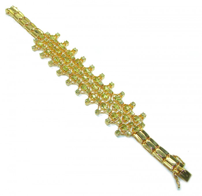 Natural 45.8 carat Peridot 14k Gold over .925 Sterling Silver handmade small size Statement Bracelet - Gold bracelet with peridot gemstones, top view.