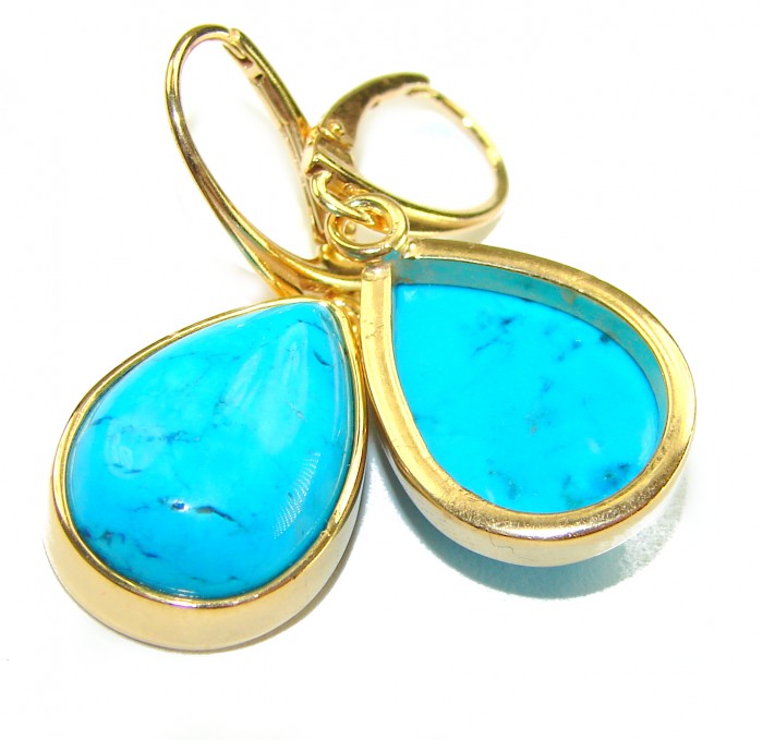 Great authentic Sleeping Beauty Turquoise 18K Gold over .925 Sterling Silver handcrafted Earrings - Close-up of Sleeping Beauty Turquoise earrings in 18K gold settings.
