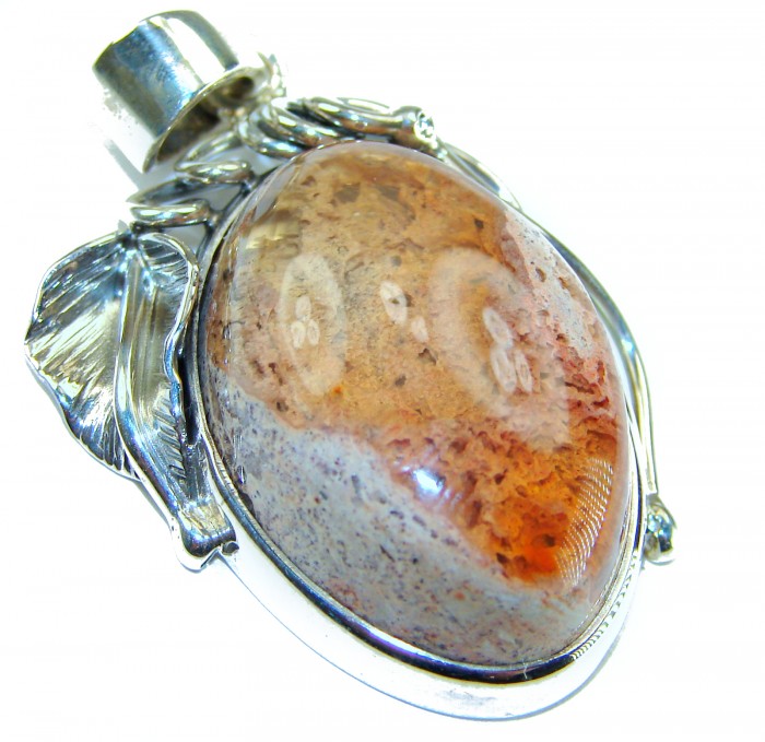 Inner Fire Natural 29.2 carat Mexican Fire Opal .925 Sterling Silver dipped in 18K Gold handmade Pendant - Stone close-up of Inner Fire Mexican Fire Opal with silver leaf detail