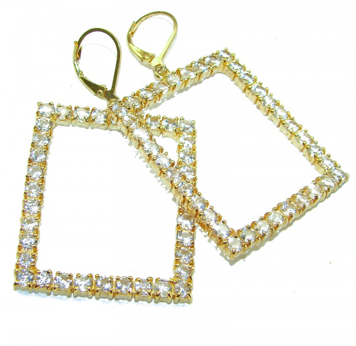 Large Extravaganza White Topaz 18K Gold over .925 Sterling Silver handcrafted Earrings - Gold earrings with white topaz, angled view showing clasp and gems.