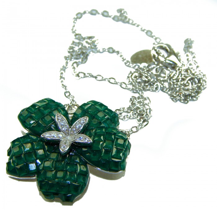 12.2 carat Graceful Authentic mystery setting Colombian Emerald .925 Sterling Silver handcrafted Statement necklace - Close-up of emerald flower pendant with silver chain and diamond accents.