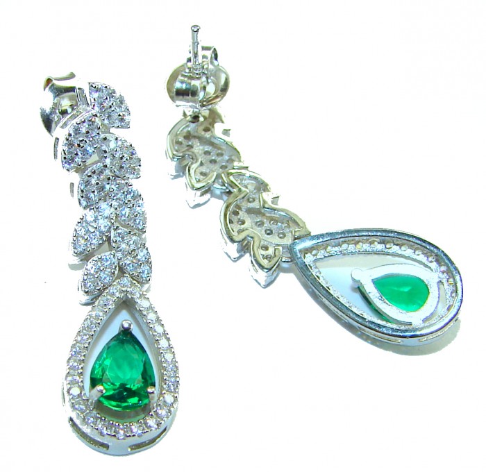 Gabriella 6.7 carat authentic Emerald rhodium over .925 Sterling Silver handcrafted Statement earrings - Emerald earrings, top view, showcasing stones and intricate design.