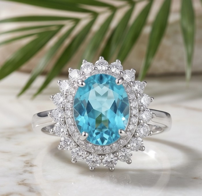 WONDERLAND 15.5 carat Paraiba Tourmaline .925 Sterling Silver Handcrafted Ring size 9 - Close-up of WONDERLAND 15.5 carat Paraiba Tourmaline ring on marble surface.