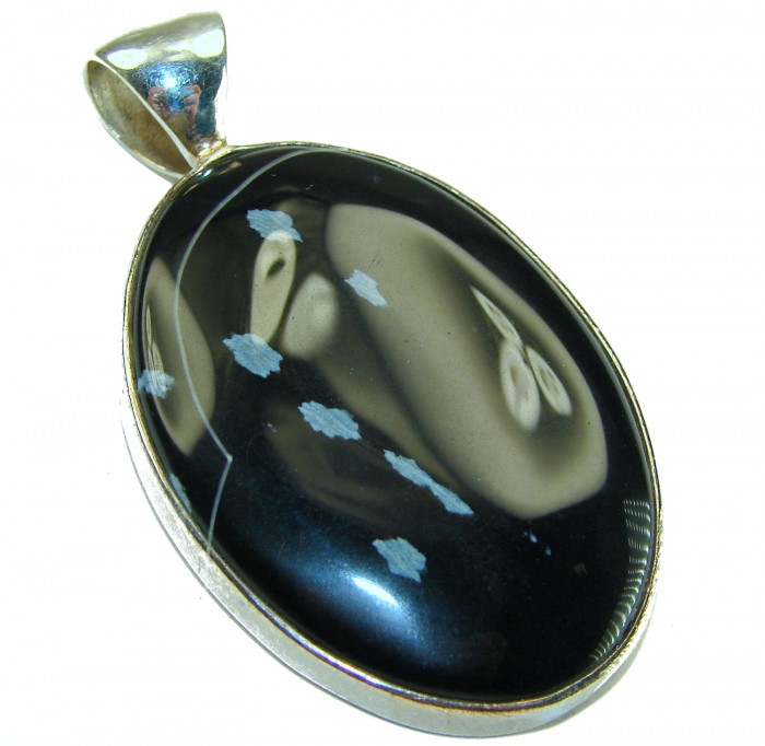 Amazing quality Snowflake Obsidian Sterling Silver handmade Pendant - Snowflake Obsidian pendant close-up on silver setting, side view.