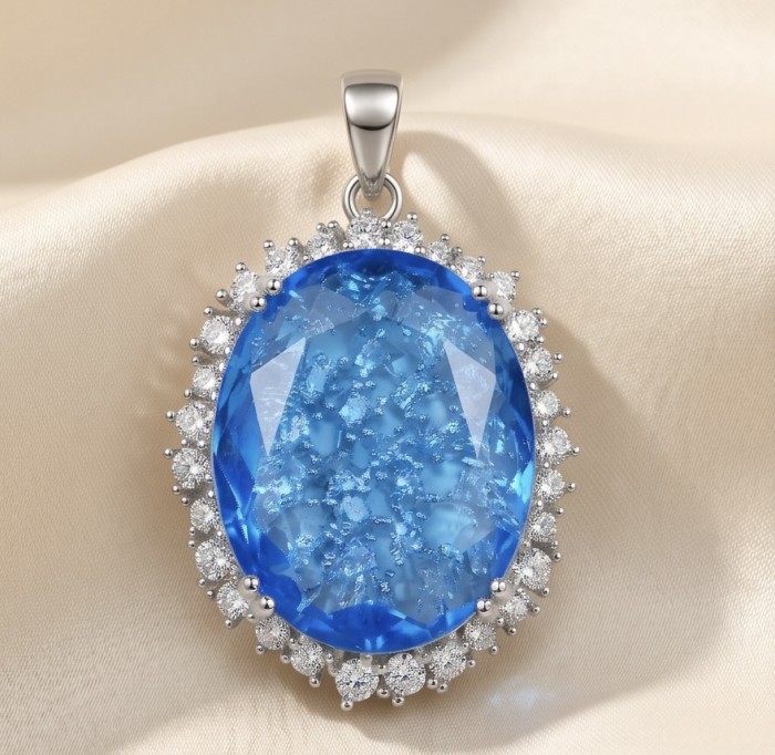 Angelina 10.9 carat authentic Swiss Blue Topaz .925 Sterling Silver Handcrafted handmade Pendant - Close-up of Angelina Swiss Blue Topaz pendant on satin background