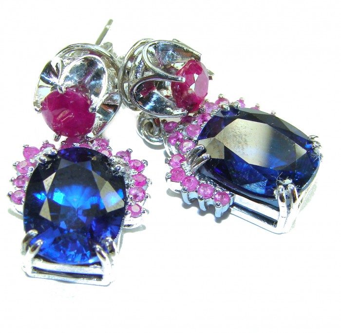Deep Ocean 24.5 carat London Blue Topaz Ruby .925 Sterling Silver handmade earrings - Close-up of deep ocean blue topaz and ruby earrings in sterling silver