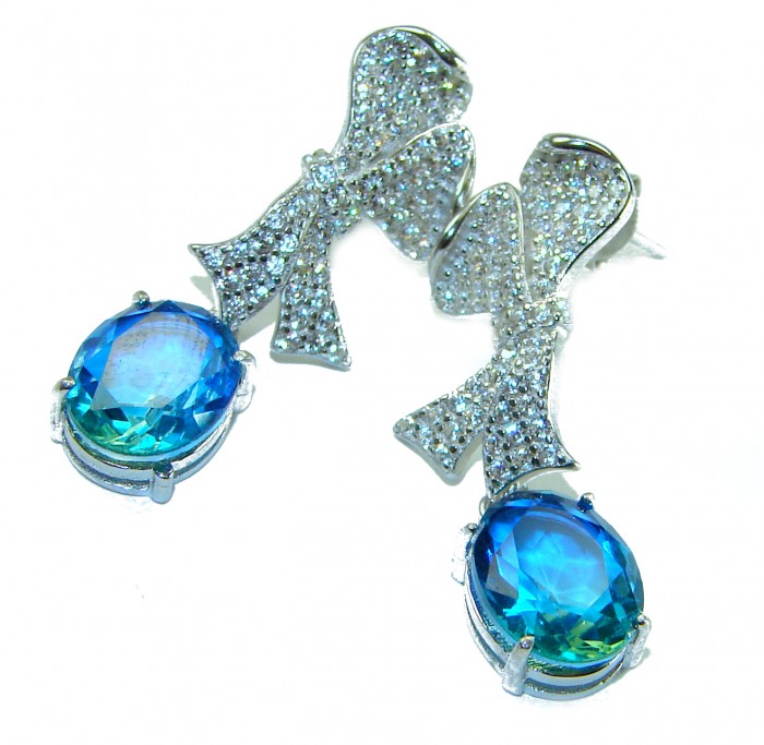 Atlantica 5.7 carat Aquamarine .925 Sterling Silver Handcrafted Statement earrings - Aquamarine sterling silver earrings with bow design, close-up view.