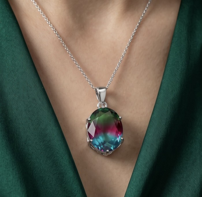 5.2 carat oval cut Brazilian Tourmaline .925 Sterling Silver Perfectly handcrafted pendant - Tourmaline pendant on chain, worn on neck, close-up view.