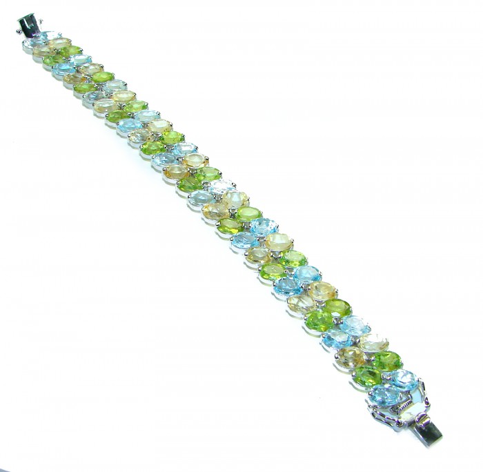 Spectacular 68.5 carat authentic Multigem .925 Sterling Silver handmade bangle Bracelet - Multigem bracelet, top view, showing stones and clasp.
