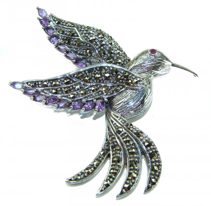 Incredible Flaying Bird Natural Amethyst Marcasite .925 Sterling Silver Brooch - Silver bird brooch with amethyst and marcasite, top view.