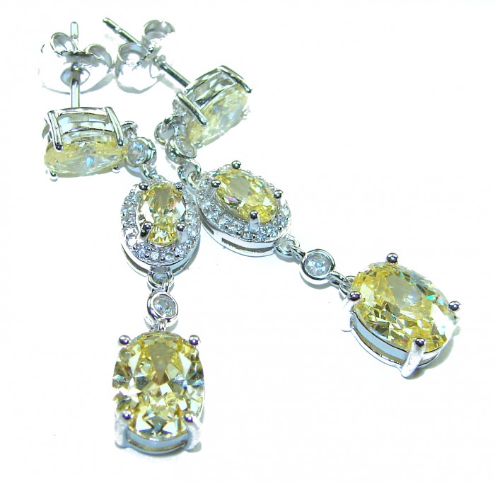 Born in Spain Luxurious Natural 7.2 carat Citrine from Spain .925 Sterling Silver handmade earrings - Elegant citrine earrings with gemstone and setting details shown.