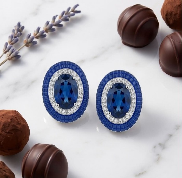 Art Deco - Incredible genuine 10.5 CARAT Sapphire .925 Sterling Silver handcrafted Earrings - Sapphire earrings front view with chocolates on marble surface.