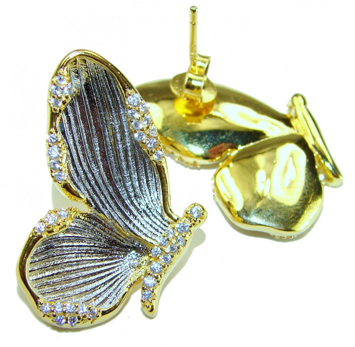 Golden Butterfly White Topaz highly polished 18K Gold over .925 Sterling Silver Italy made Earrings - Golden butterfly earrings with white topaz, angled front view.