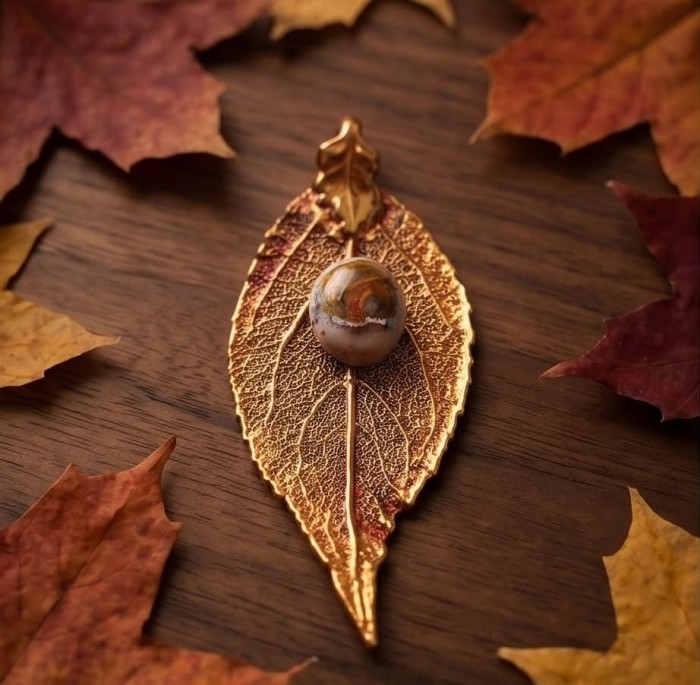 Stylish REAL Leaf dipped in copper Mexican Opal .925 Sterling Silver and Copper Pendant - Leaf jewelry with Mexican Opal on wood, surrounded by autumn leaves.