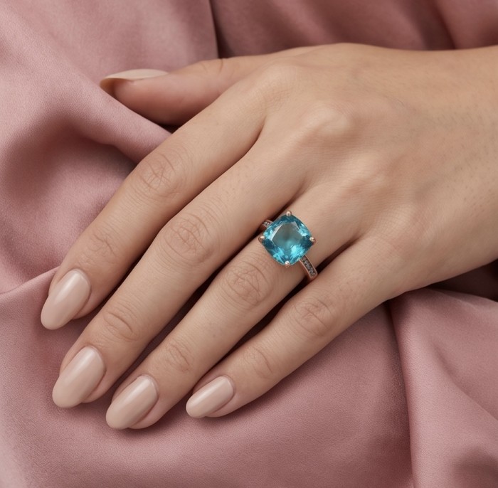 Costa del Sol 7.8 carat Apatite 14K Rose Gold .925 Sterling Silver Handcrafted Statement Ring size 7 - Apatite ring in rose gold worn on hand, on pink fabric background.