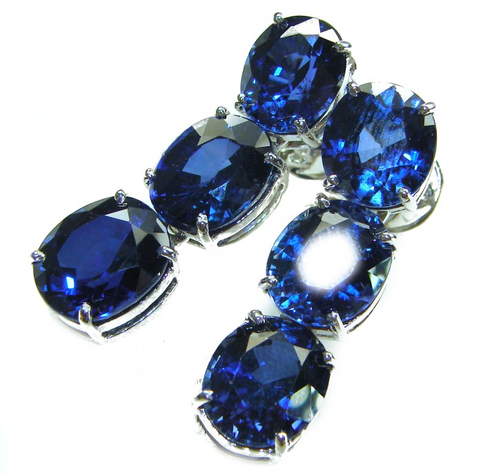 Oceania - Deep Ocean 22.5 carat London Blue Topaz .925 Sterling Silver handmade Statement earrings - Close-up of 22.5 carat London Blue Topaz set in .925 sterling silver.