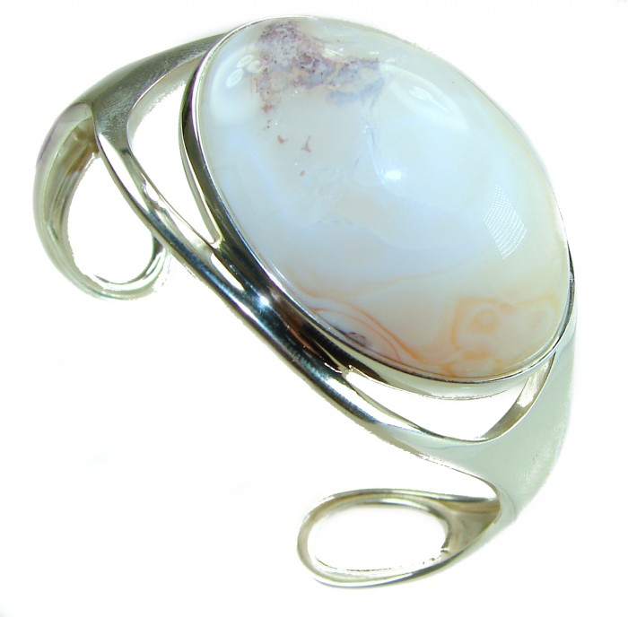 Full of Secrets 125.5 carat Genuine Mexican white Fire Opal handcrafted .925 Sterling Silver Bracelet / Cuff - Side view of silver bracelet with Mexican white Fire Opal stone.