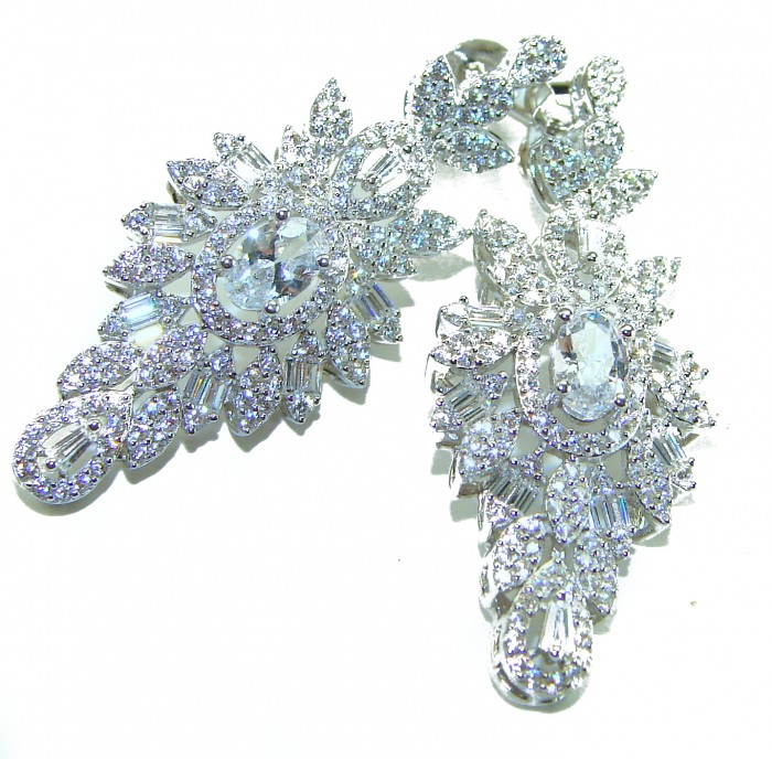 LUXURIUS 12.2 carat White Topaz .925 Sterling Silver handcrafted earrings - Luxury earrings with white topaz stones, front view detail.