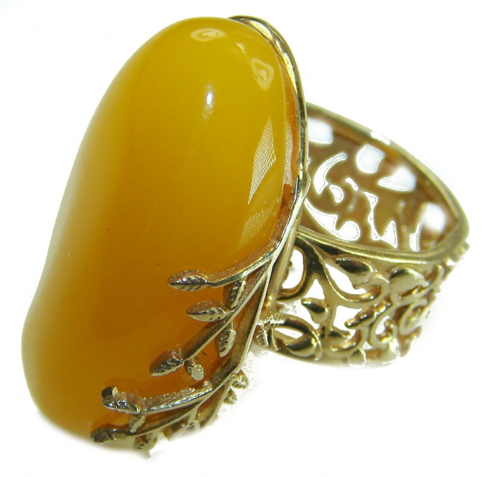 Authentic Golden Butterscotch Baltic Amber 18K Gold over .925 Sterling Silver entirely handcrafted ring; s. 7 adjustable - Side view of authentic golden butterscotch Baltic amber ring in 18K gold.