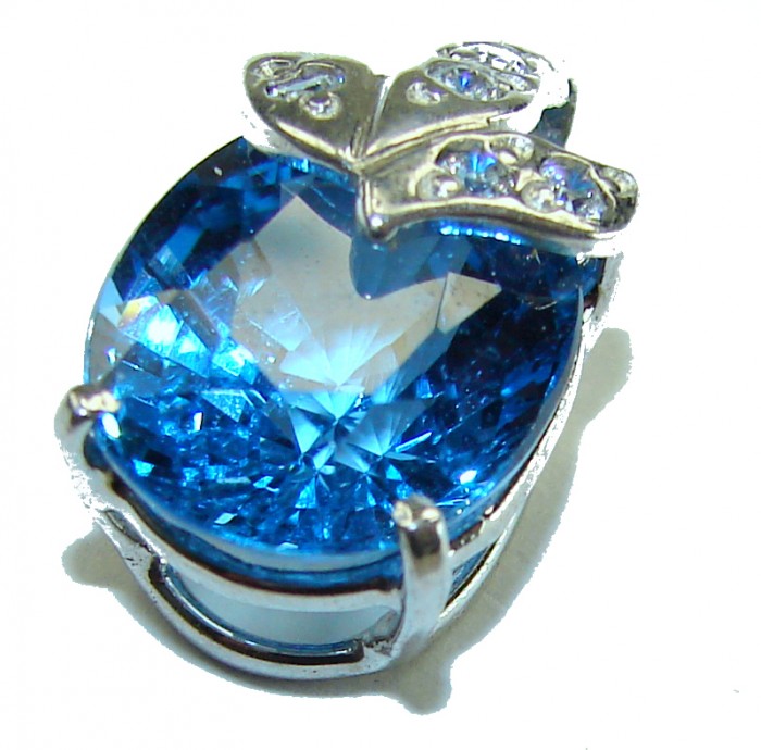 Atlantica 7.5 carat Swiss Blue Topaz .925 Sterling Silver Handcrafted pendant - Close-up of 7.5 carat Swiss Blue Topaz with silver butterfly detail