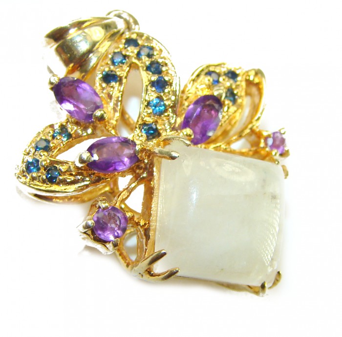 Genuine 11.2 carat Fire Moonstone 14K Gold over .925 Sterling Silver handcrafted pendant - Moonstone pendant with amethyst and blue gems, angled close-up view