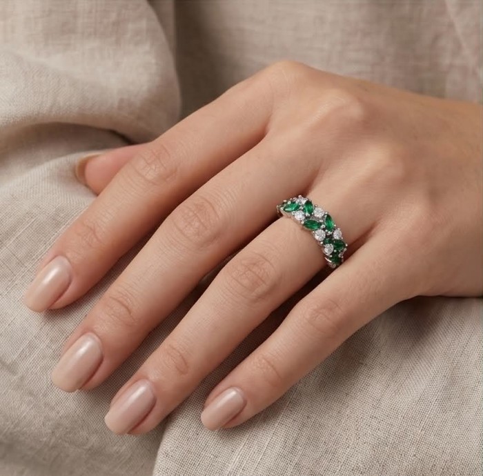 Authentic 2.8 carat CHROME Diopside .925 Sterling Silver handcrafted Ring size 6 - Ring with green stones worn on hand, showcasing design.