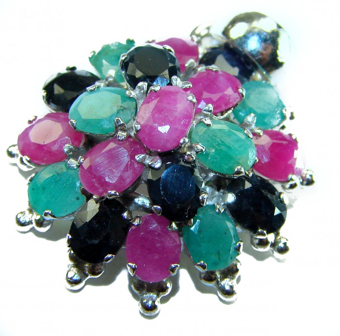 Floral-inspired authentic 10.5 carat Ruby Sapphire .925 Sterling Silver handcrafted Pendant - Close-up of floral-inspired gemstone brooch with rubies and sapphires.