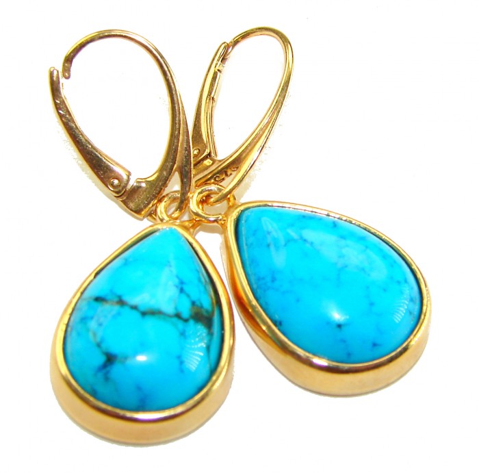 Great authentic Sleeping Beauty Turquoise 18K Gold over .925 Sterling Silver handcrafted Earrings - Close-up of turquoise earrings with gold leverback clasps.