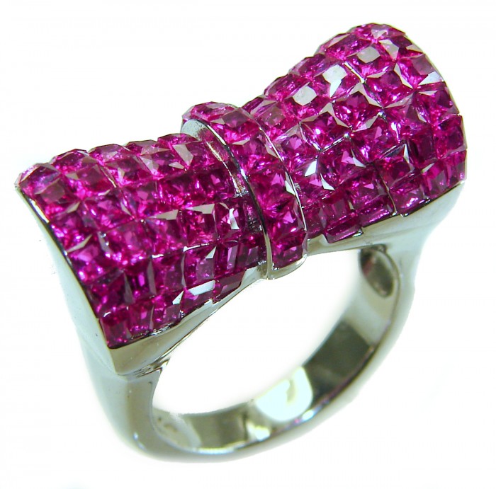 Luxurious Bow - natural 15.5 carat Ruby .925 Sterling Silver handmade Statement Ring size 6 1/2 - Bow-shaped ring with 15.5 carat rubies in sterling silver, side view.