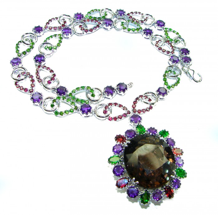 Outstanding 47.5 carat authentic Smoky Topaz .925 Sterling Silver handcrafted Statement necklace - Close-up of Smoky Topaz necklace with colorful gemstones and silver details.