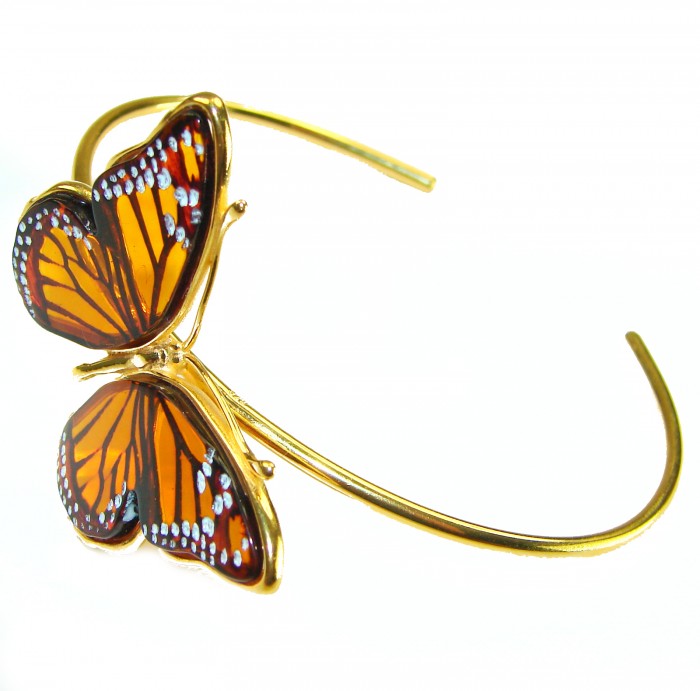 Golden Butterfly Genuine carved Baltic Amber .925 Sterling Silver dipped in 18K Gold handamde Bracelet - Side view of golden butterfly bracelet with amber wings.