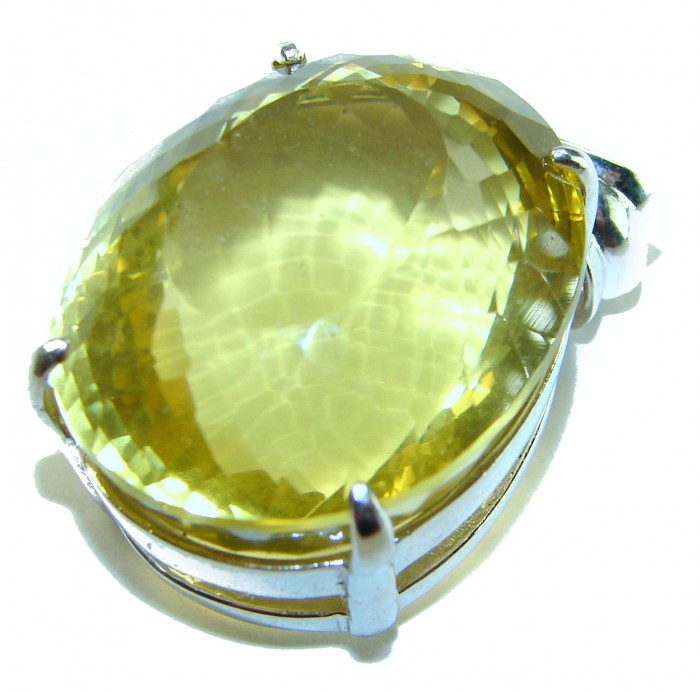 Perfection Oval cut 49.3 carat Lemon Quartz .925 Sterling Silver handcrafted LARGE pendant - Close-up of oval cut lemon quartz in sterling silver setting.