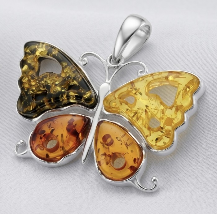 Cute Butterfly Authentic carved Baltic Amber .925 Sterling Silver handcrafted pendant - Butterfly pendant with multicolored amber and silver, front view.
