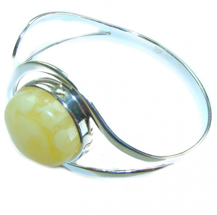 MODERN Design Genuine 15.5 carat Butterscotch Baltic Amber .925 Sterling Silver handmade Bracelet - Side view of silver bracelet with butterscotch Baltic amber stone.