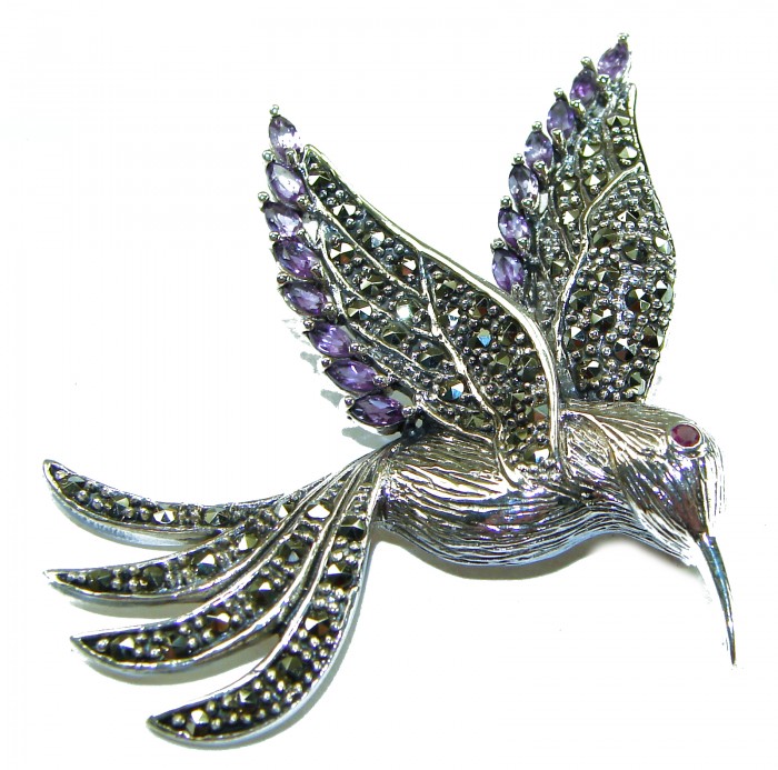 Incredible Flaying Bird Natural Amethyst Marcasite .925 Sterling Silver Brooch - Flying bird brooch with amethyst and marcasite, angled top view.