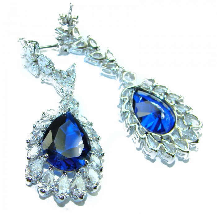 Giovanna - Authentic pear cut 22.9 carat Sapphire .925 Sterling Silver handcrafted earrings - Close-up of Giovanna pear cut sapphire earrings with crystal accents.