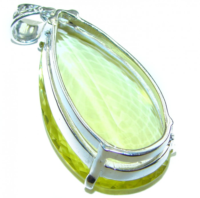 Goddess of Light - 58.5 carat Large Lemon Topaz .925 Sterling Silver handmade Pendant - Side view of 58.5 carat Lemon Topaz pendant in sterling silver setting