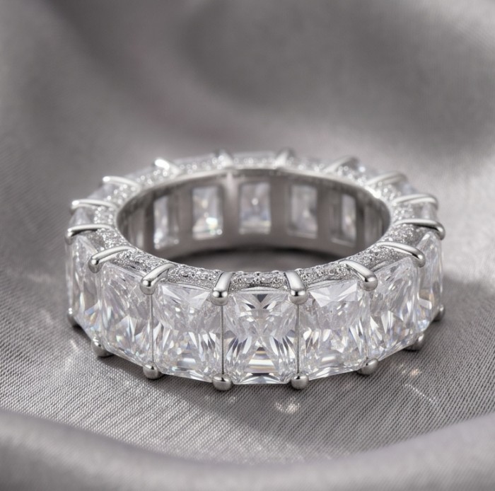 Eternity- 14.8 carat White Topaz Silver tone handcrafted Soild ring size 6 - Eternity ring with white topaz, silver tone, side view on gray fabric.