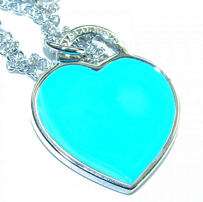 Angel's Heart inlay Turquoise .925 Sterling Silver handcrafted necklace - Turquoise heart pendant close-up, silver chain detail.