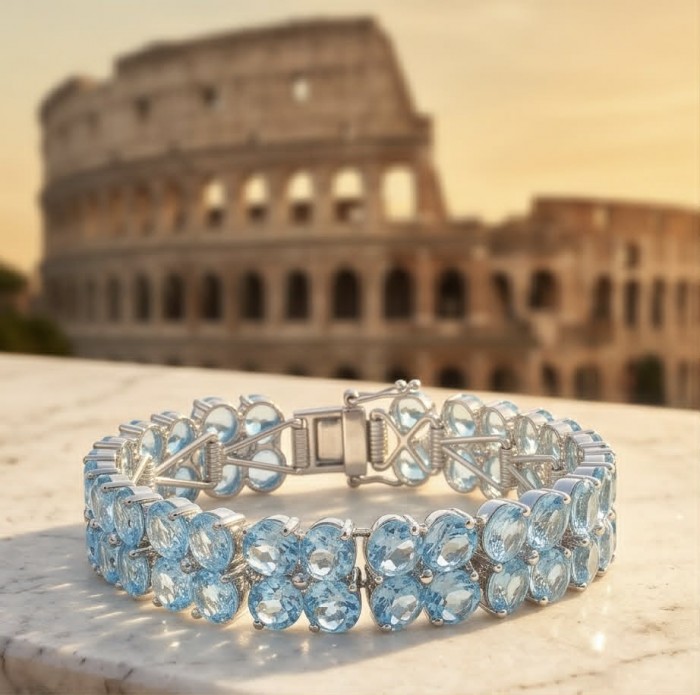 Tiffany - Magnificent 105.5 carat Swiss Blue Topaz .925 Sterling Silver handcrafted Heavy Bracelet - Blue topaz bracelet with Colosseum backdrop, showcasing stone details.