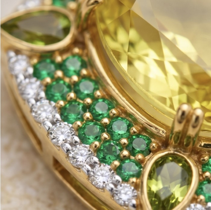 Tiffany - amazing quality 26.7 CARAT genuine Brazilian Citrine 18 K Gold over .925 Sterling Silver handmade pendant - Close-up of gemstone and green, white accents on gold jewelry piece.