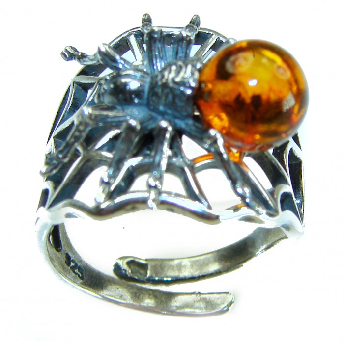 Golden Spider Authentic Baltic Amber .925 Sterling Silver handcrafted ring; s. 7 adjustable - Sterling silver ring with amber spider on web, close-up angle.