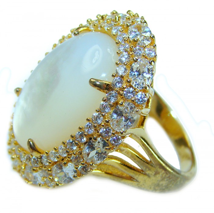 Luxurious Blister Pearl 1.03 carat lab. grown diamonds 18K Gold over .925 Sterling Silver brilliantly handcrafted ring s. 7 1/2 - Side view of luxurious pearl ring with diamonds, 18K gold setting.