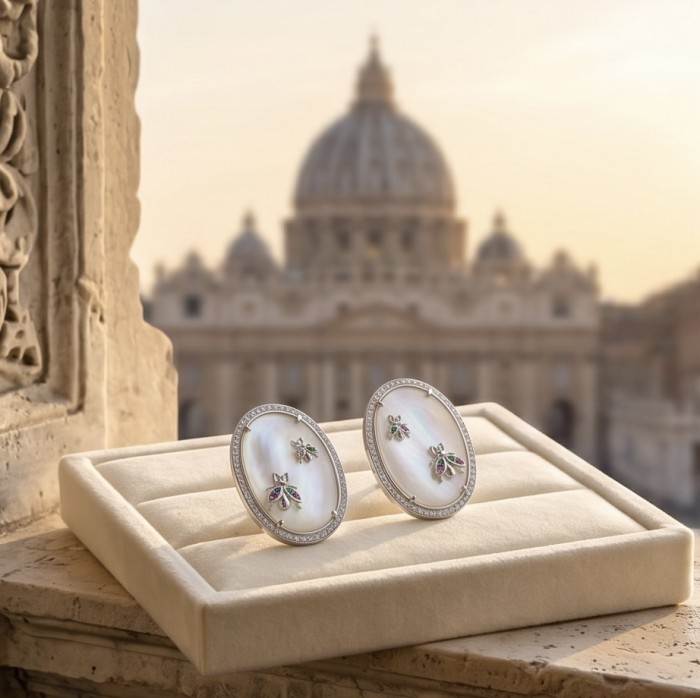Genuine Blister Pearl lab grown Diamond rhodium over .925 Sterling Silver handcrafted Large Statement Earrings - Earrings on display with Vatican dome in background, angled front view.