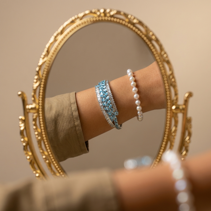 Pacifica - One of the kind - 45.2 carat Swiss Blue Topaz .925 Sterling Silver handmade Bracelet - Worn on hand, 45.2 carat Swiss Blue Topaz and pearl bracelet in mirror.