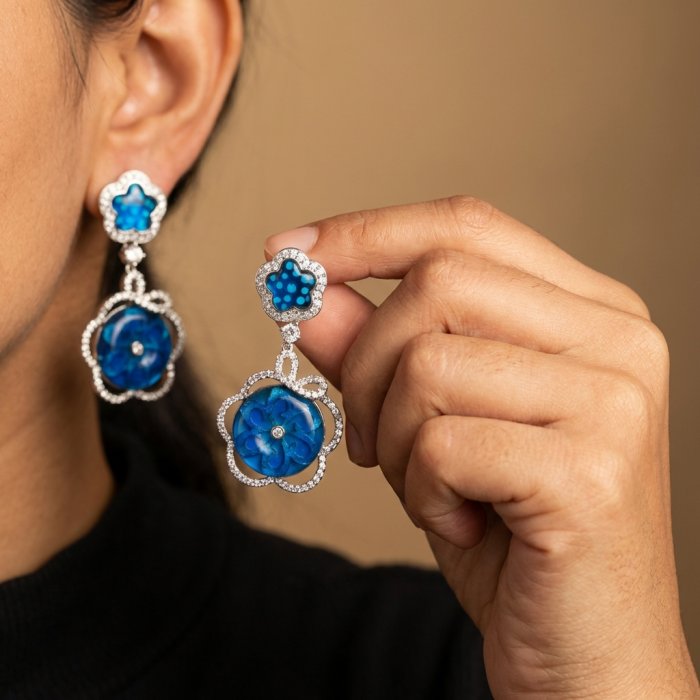 Giovanna - Authentic 21.9 carat Topaz .925 Sterling Silver handcrafted earrings - Earrings worn close-up with blue topaz and sterling silver detail.
