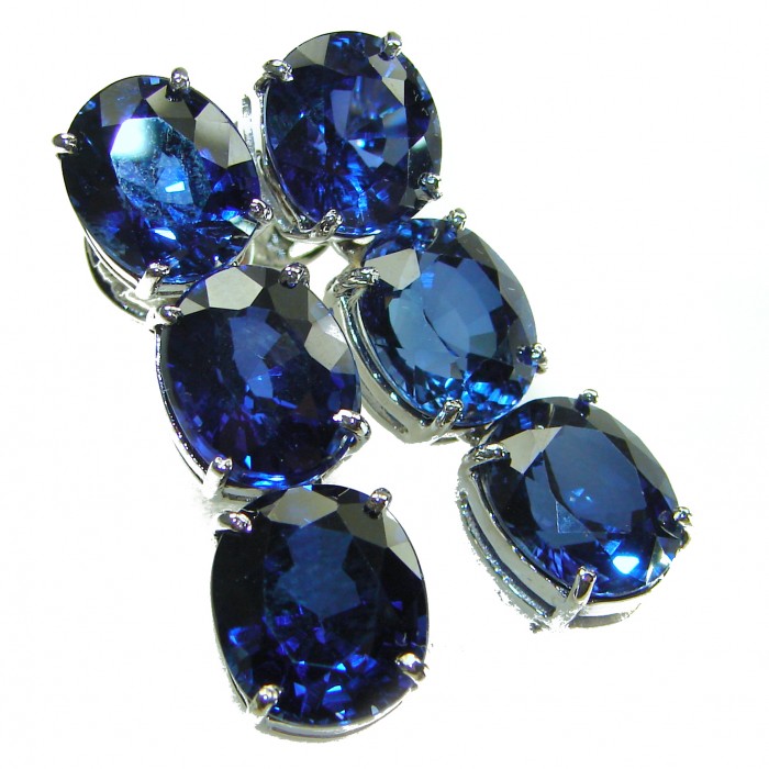 Oceania - Deep Ocean 22.5 carat London Blue Topaz .925 Sterling Silver handmade Statement earrings - Close-up of Oceania Deep Ocean London Blue Topaz in sterling silver settings