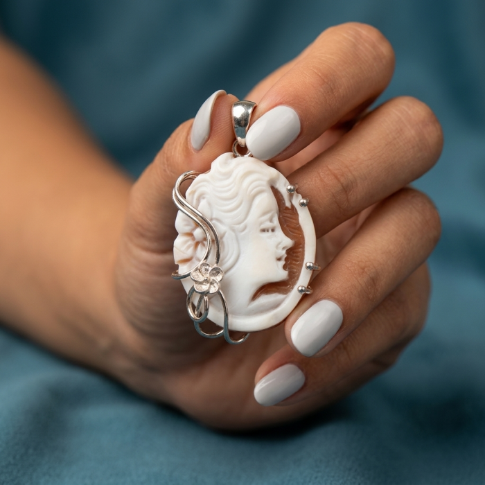 Exquisite vintage style Cameo .925 Sterling Silver handcrafted Made in Italy Statement pendant - Close-up of vintage style cameo pendant in hand.
